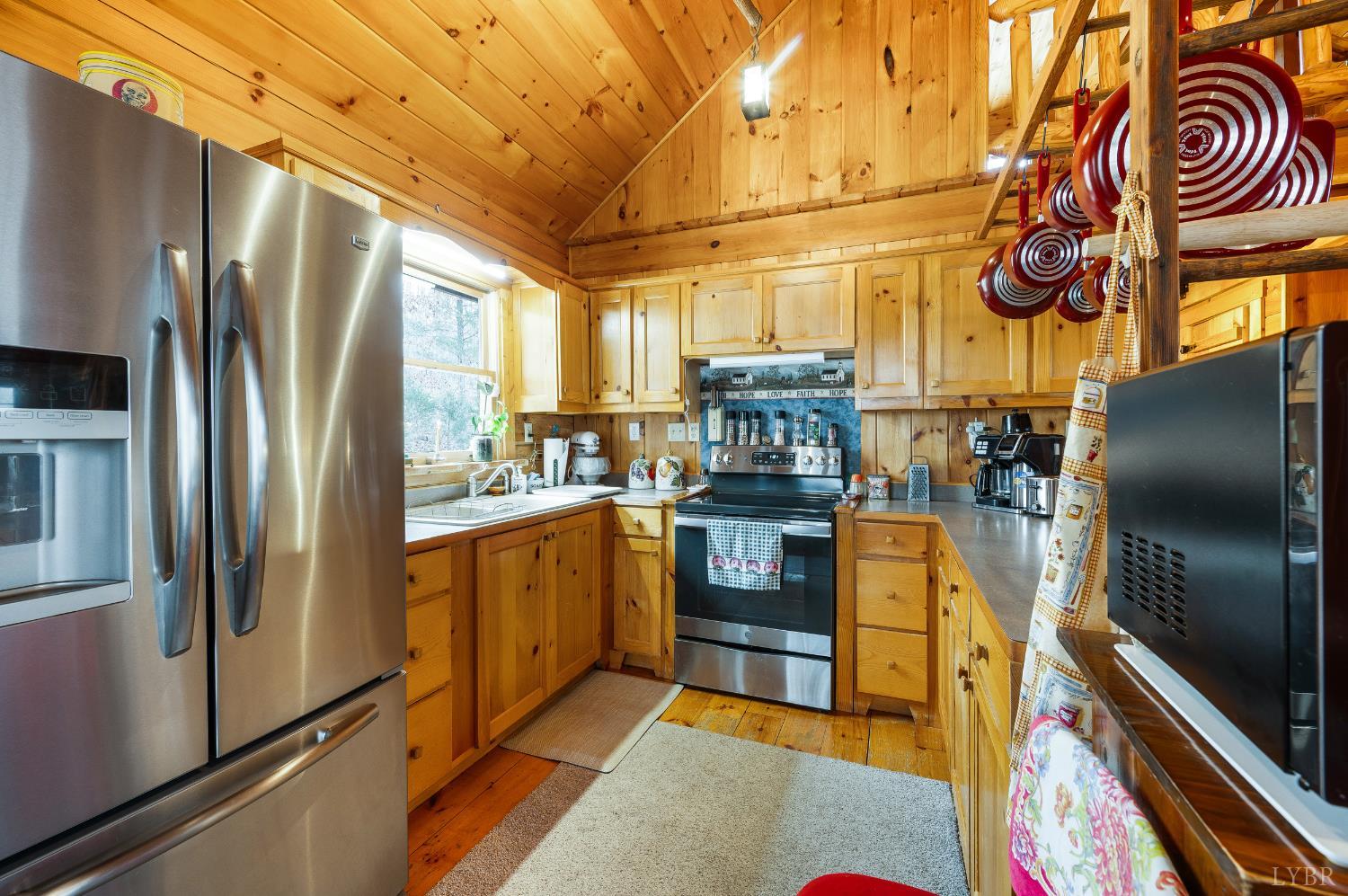 2080 Keys Church Road Shipman, VA 22971 - Photo 11 of 53 a kitchen with stainless steel appliances granite countertop a refrigerator and a stove
