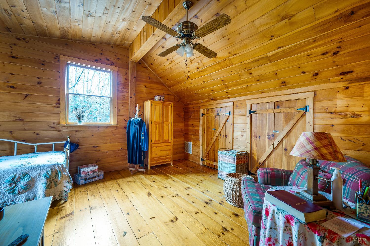 2080 Keys Church Road Shipman, VA 22971 - Photo 26 of 53 a bedroom with furniture and a large window