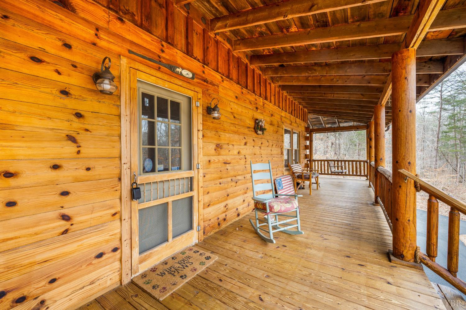 2080 Keys Church Road Shipman, VA 22971 - Photo 38 of 53 a view of a patio with table and chairs and wooden floor