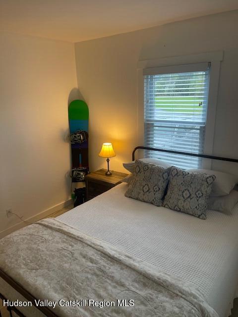 9580 Rte 9W Athens, NY 12015 - Photo 20 of 35 a bedroom with a bed and window