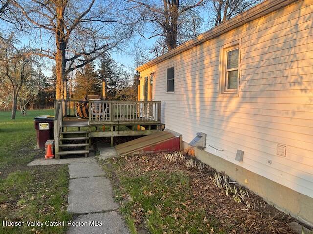 9580 Rte 9W Athens, NY 12015 - Photo 31 of 35 a view of a back yard with a wooden fence