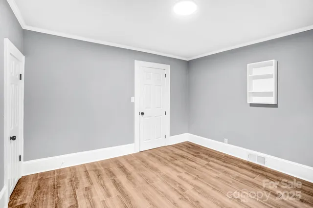 a bathroom with a sink vanity and a mirror