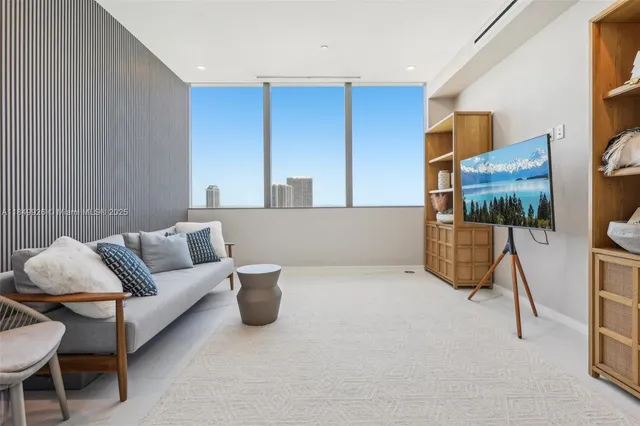 a spacious bathroom with a large tub and shower