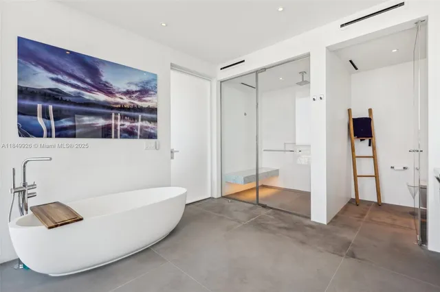 a bedroom with a bed and a cabinets