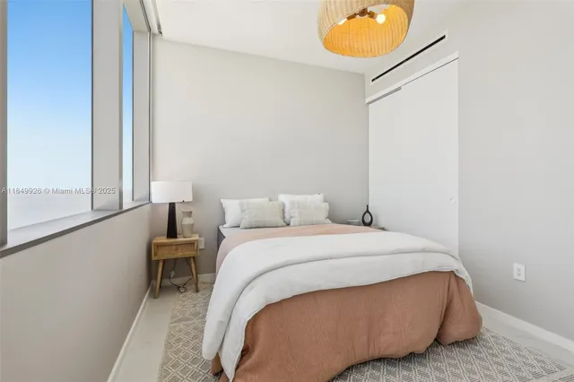 a view of a chairs and table in the back