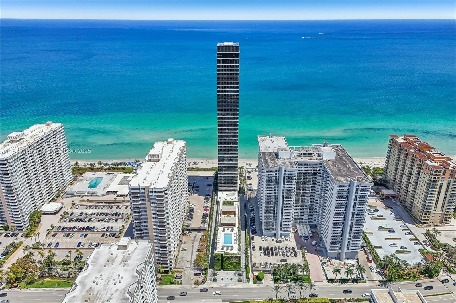 2000 South Ocean Drive, Unit 28A Hallandale Beach, FL 33009 - Photo 61 of 66 a view of an ocean with a building in the background
