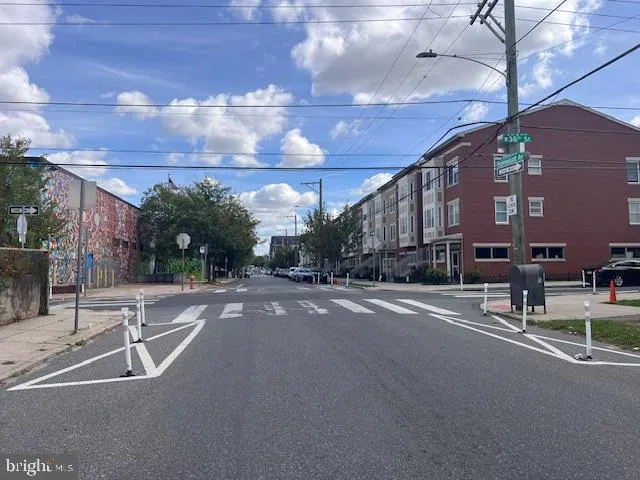 a view of a building with a street