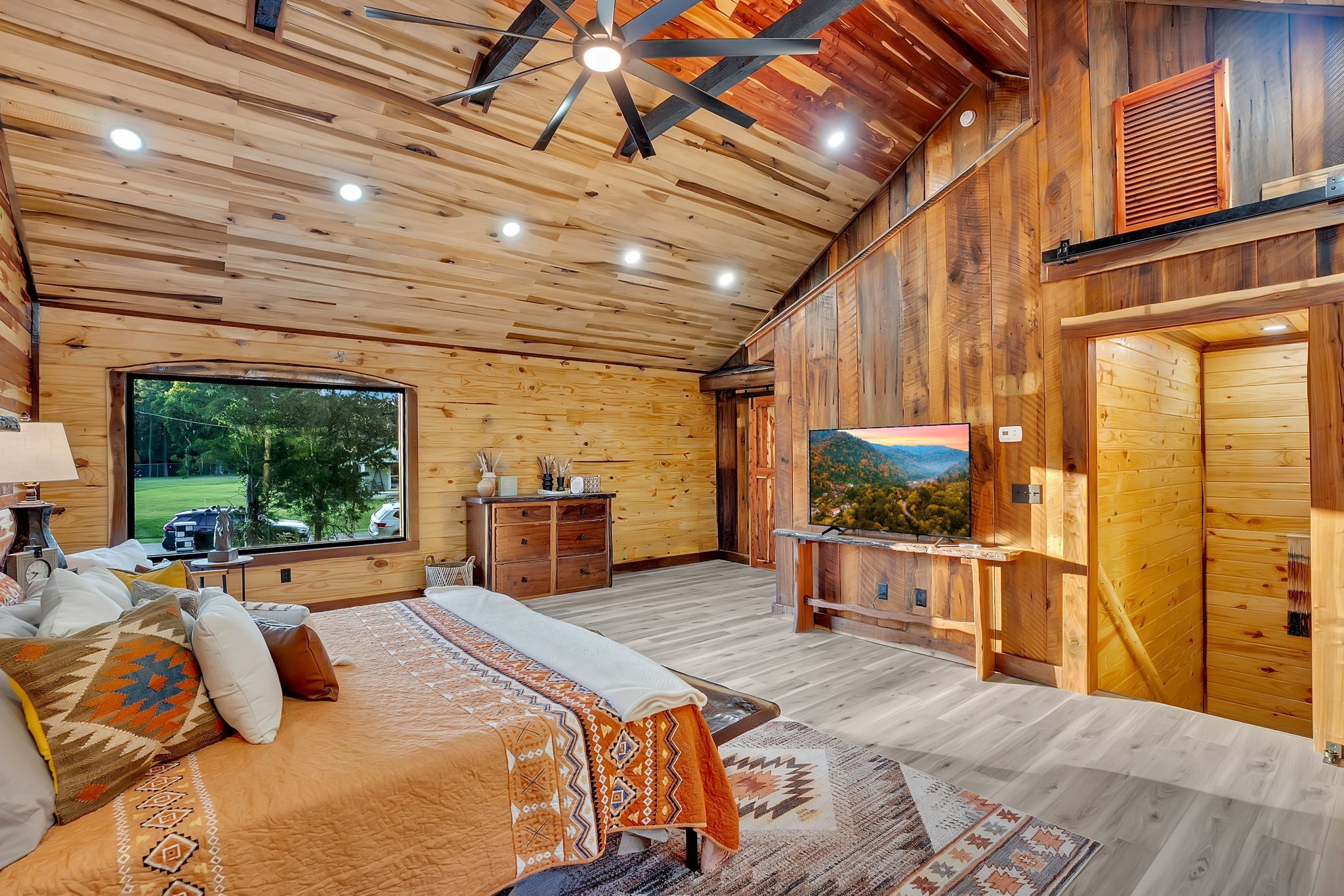 92 Ghea Road Normandy, TN 37360 - Photo 19 of 52 a bed room with a bed and a television