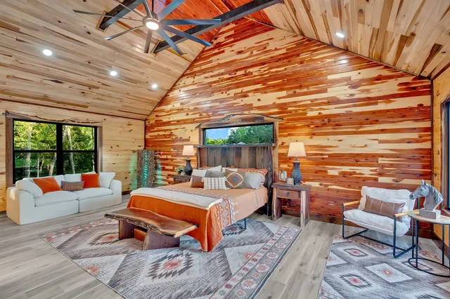 a outdoor space with patio lots of furniture and wooden floor