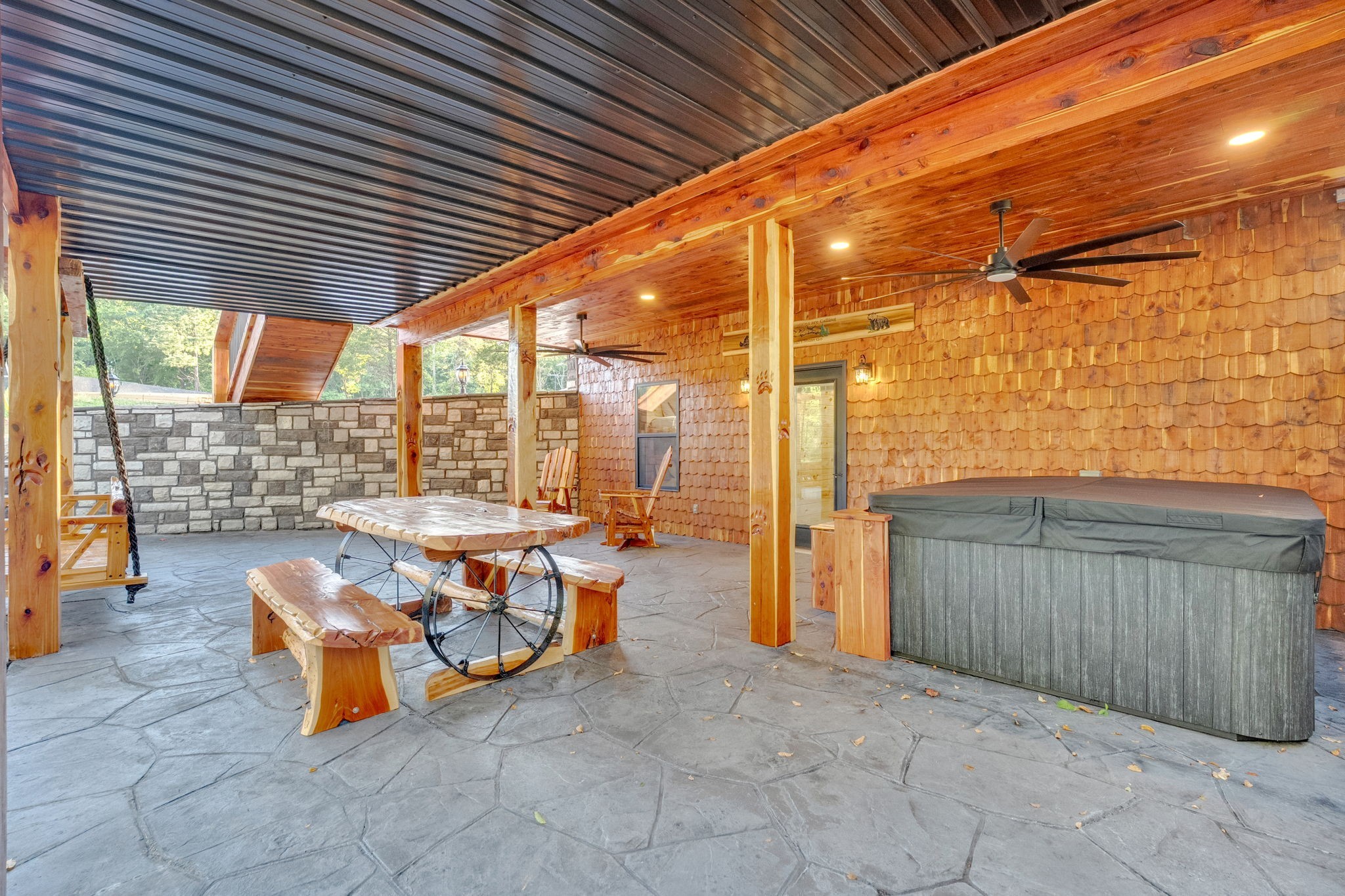92 Ghea Road Normandy, TN 37360 - Photo 24 of 52 a backyard of a house with barbeque oven table and chairs