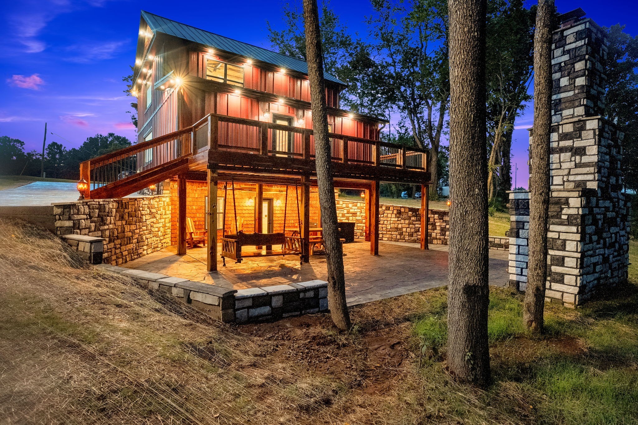 92 Ghea Road Normandy, TN 37360 - Photo 3 of 52 a backyard of a house with barbeque oven table and chairs