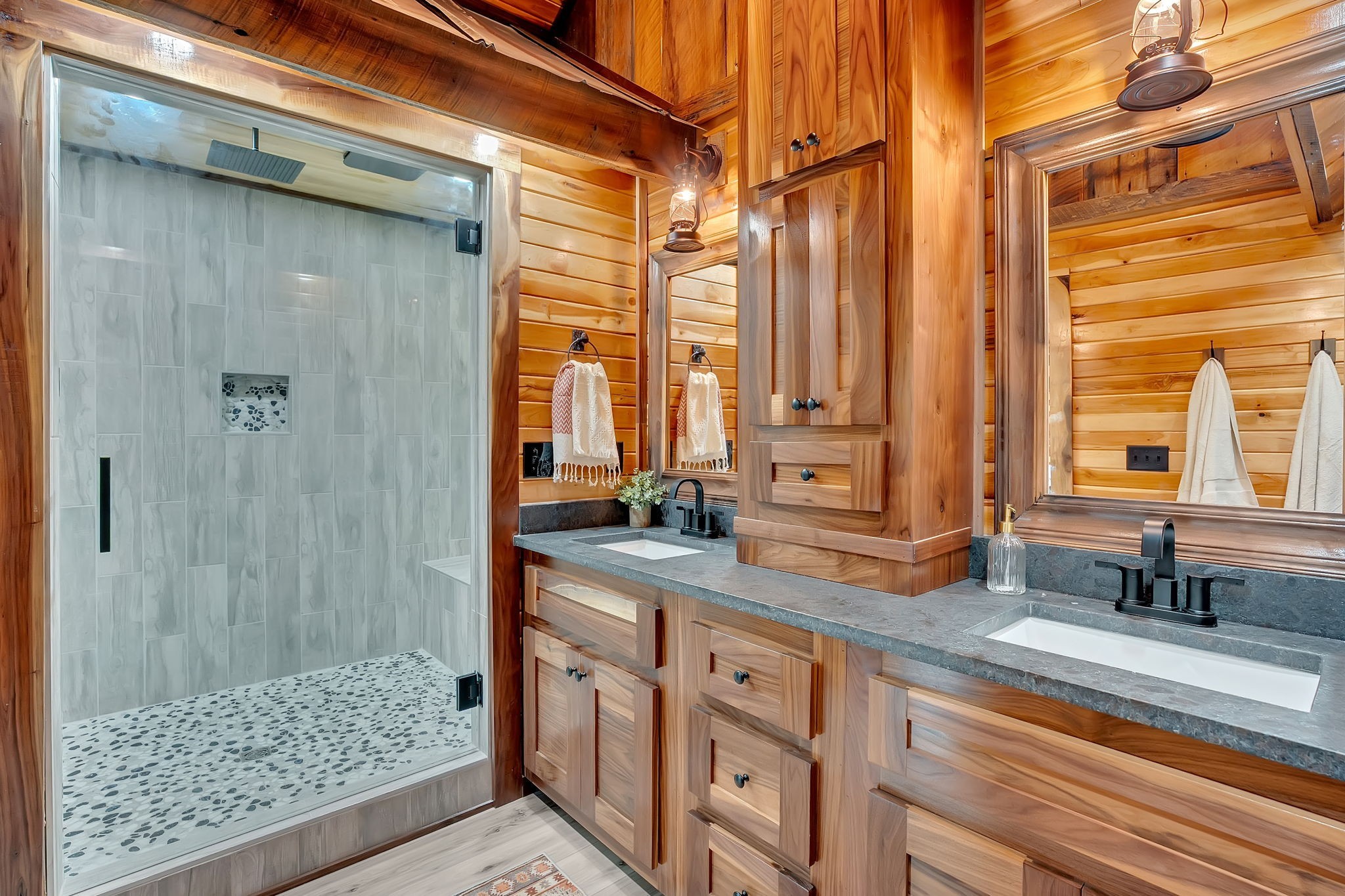 92 Ghea Road Normandy, TN 37360 - Photo 39 of 52 a bathroom with a double vanity sink and a mirror