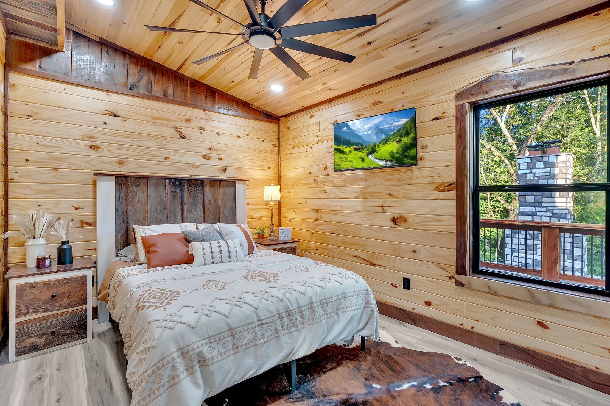 92 Ghea Road Normandy, TN 37360 - Photo 41 of 52 a bedroom with a bed and large windows