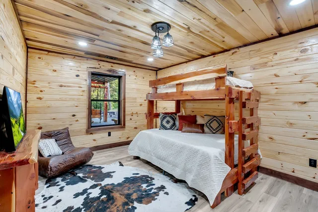 a room with table tennis and wooden floor