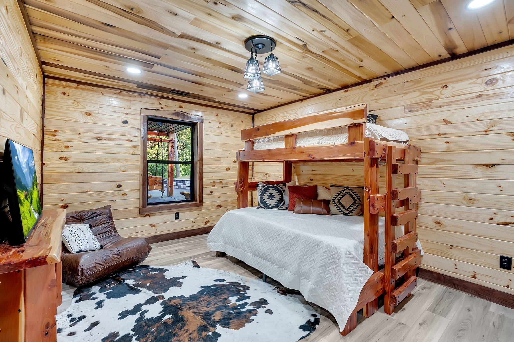 92 Ghea Road Normandy, TN 37360 - Photo 44 of 52 a bedroom with furniture and a bed