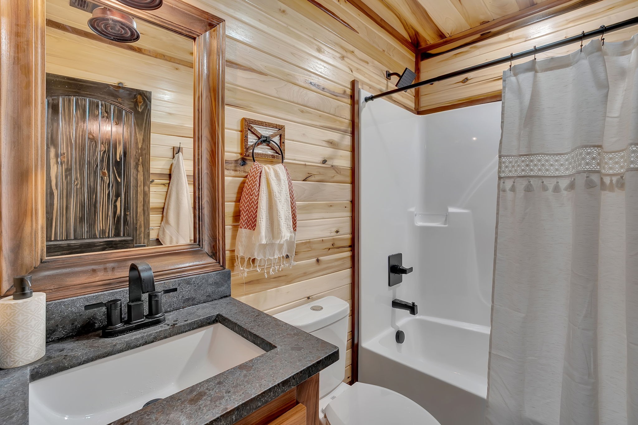 92 Ghea Road Normandy, TN 37360 - Photo 50 of 52 a bathroom with a granite countertop sink toilet and shower