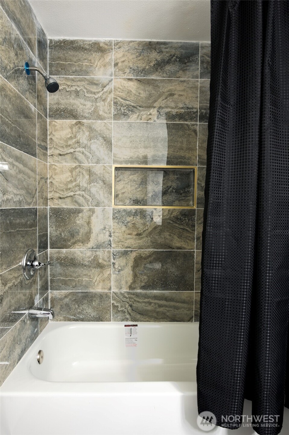 1555 Union Avenue Northeast, Unit G38 Renton, WA 98059 - Photo 13 of 18 a bathroom with a bathtub