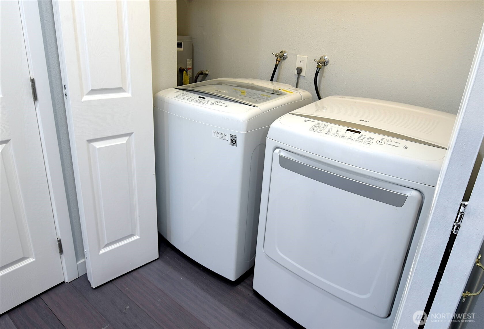 1555 Union Avenue Northeast, Unit G38 Renton, WA 98059 - Photo 16 of 18 a utility room with dryer and washer