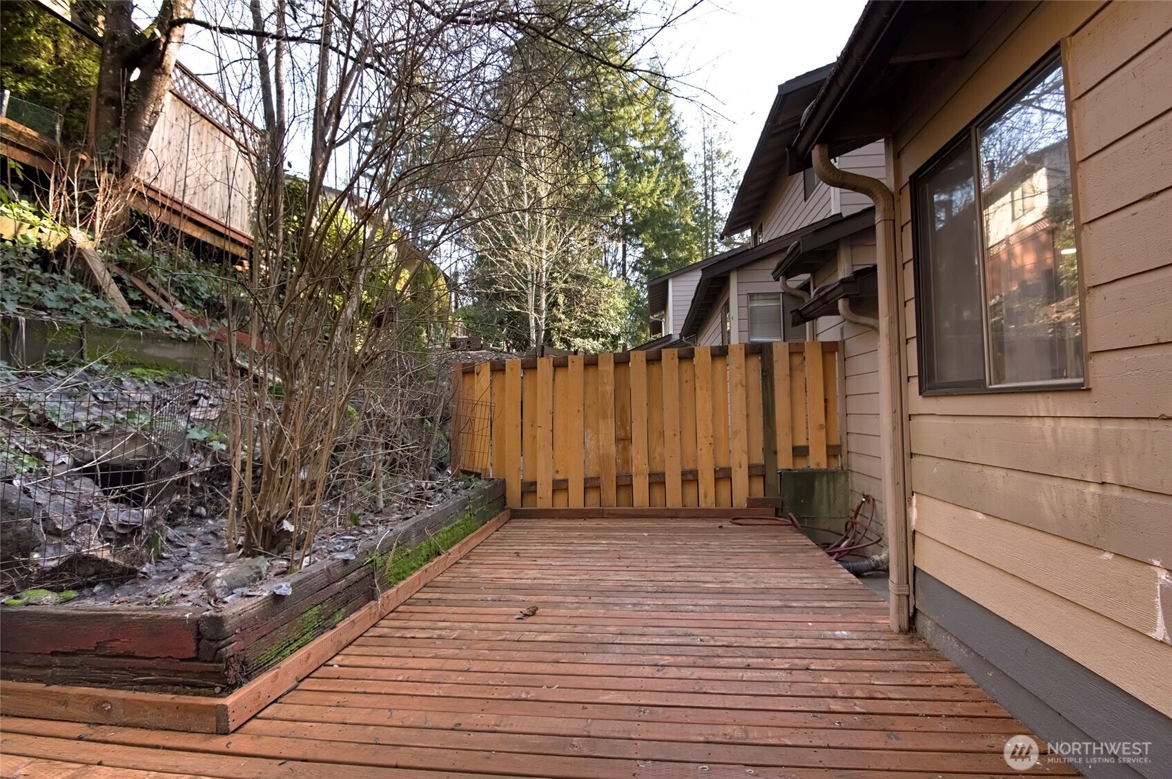 1555 Union Avenue Northeast, Unit G38 Renton, WA 98059 - Photo 17 of 18 a view of a backyard of the house