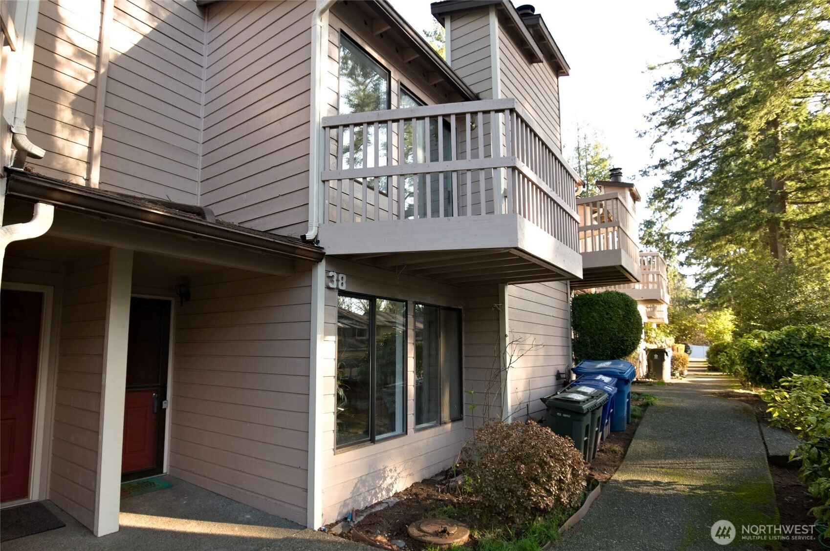 1555 Union Avenue Northeast, Unit G38 Renton, WA 98059 - Photo 18 of 18 a view of a house with sitting area and garden