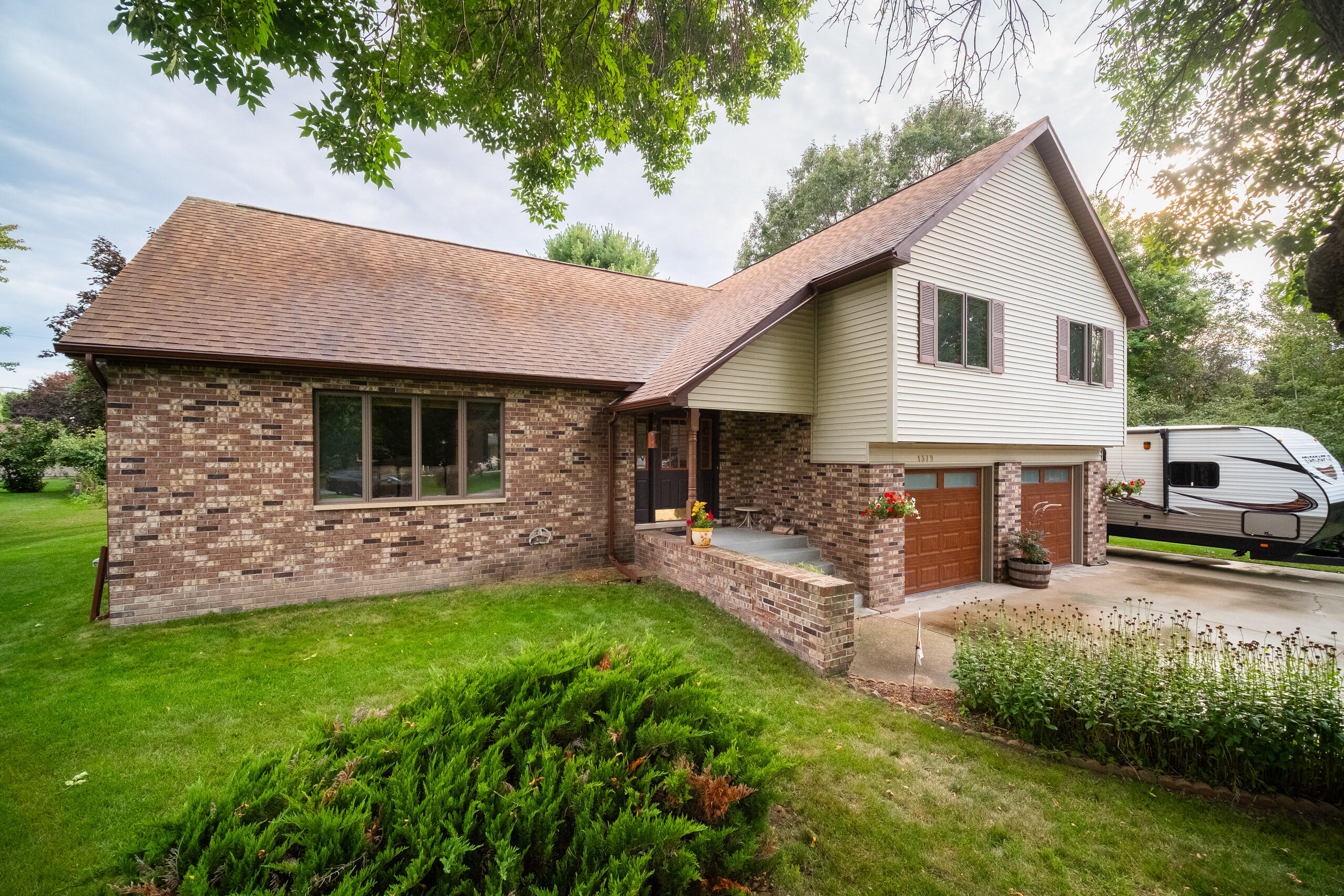 1379 Brown Road Manistee, MI 49660 - Photo 1 of 57 Front of Home