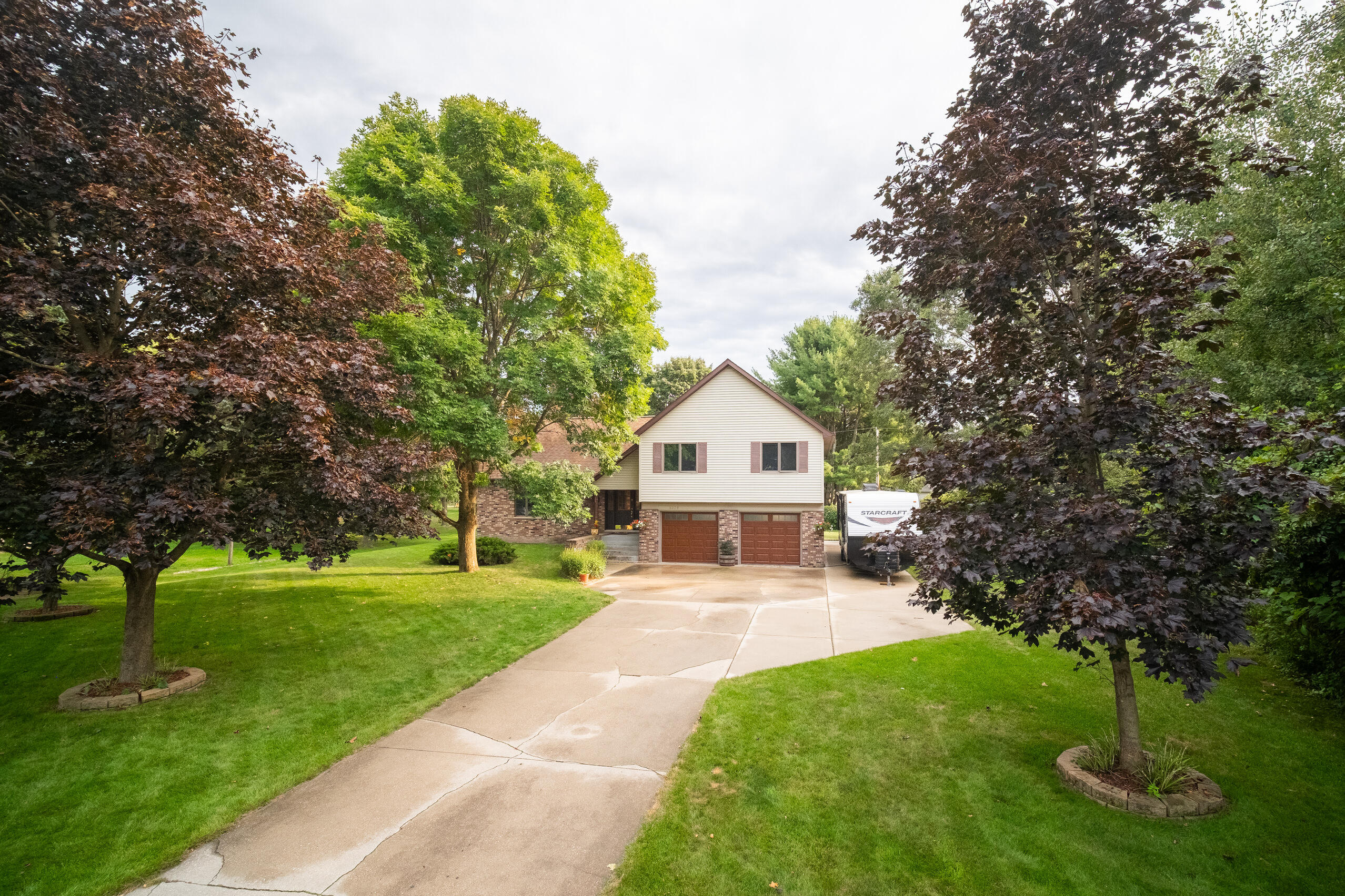 1379 Brown Road Manistee, MI 49660 - Photo 44 of 57 Large Apron by garage