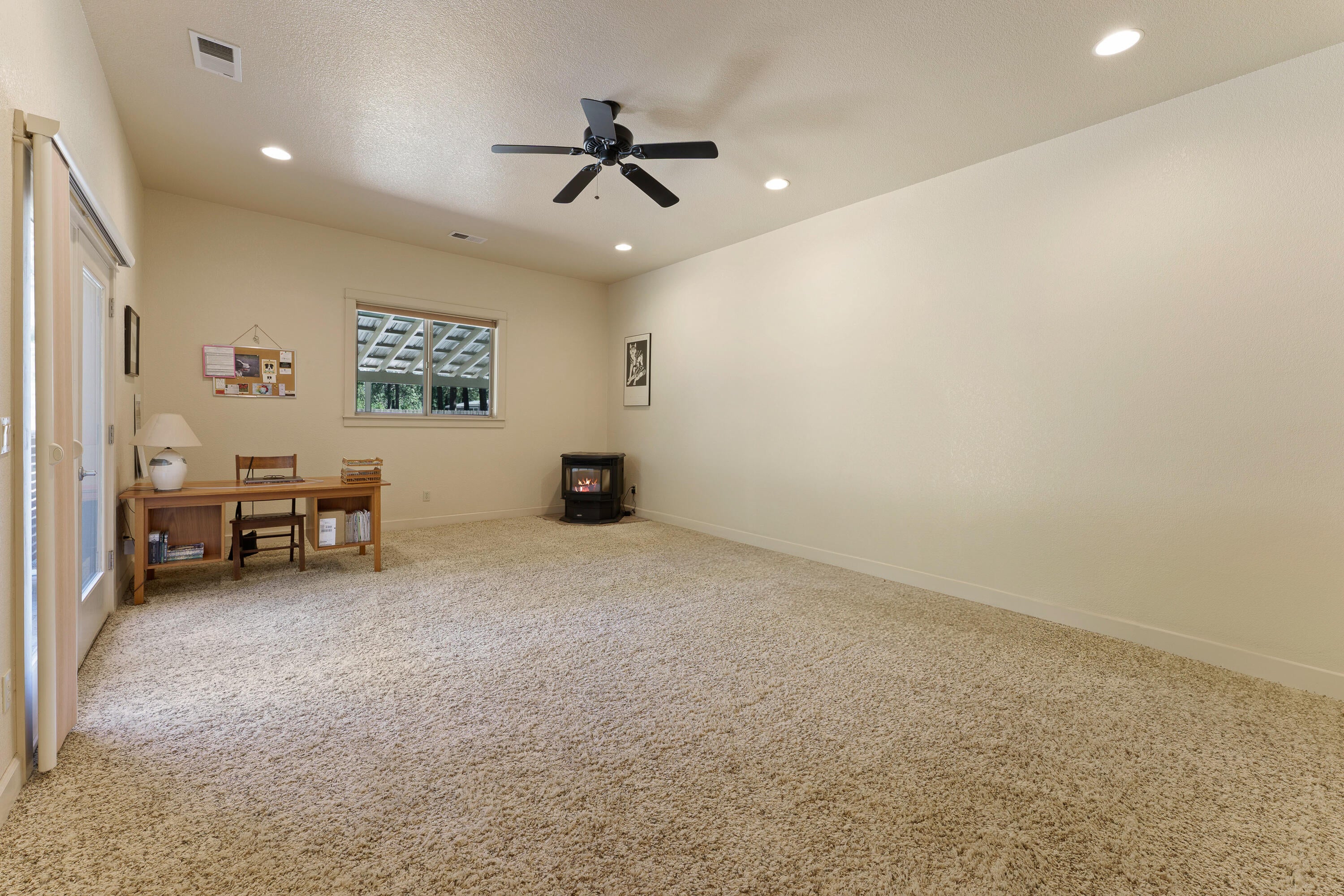 19236 Kiowa Road Bend, OR 97702 - Photo 34 of 52 Bonus space with pellet stove