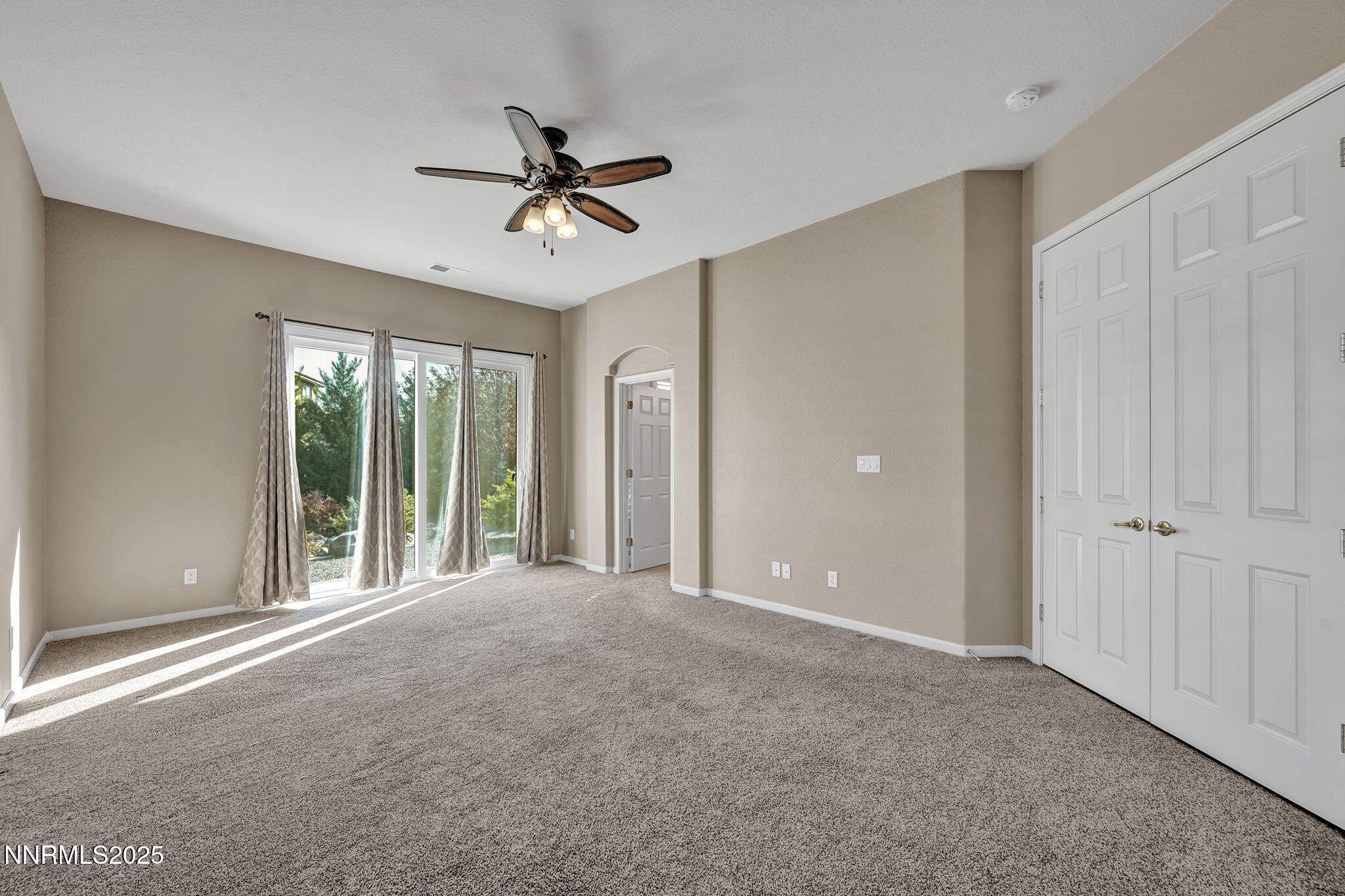 823 Gullane Court Dayton, NV 89403 - Photo 22 of 60 a view of a livingroom with a ceiling fan and window