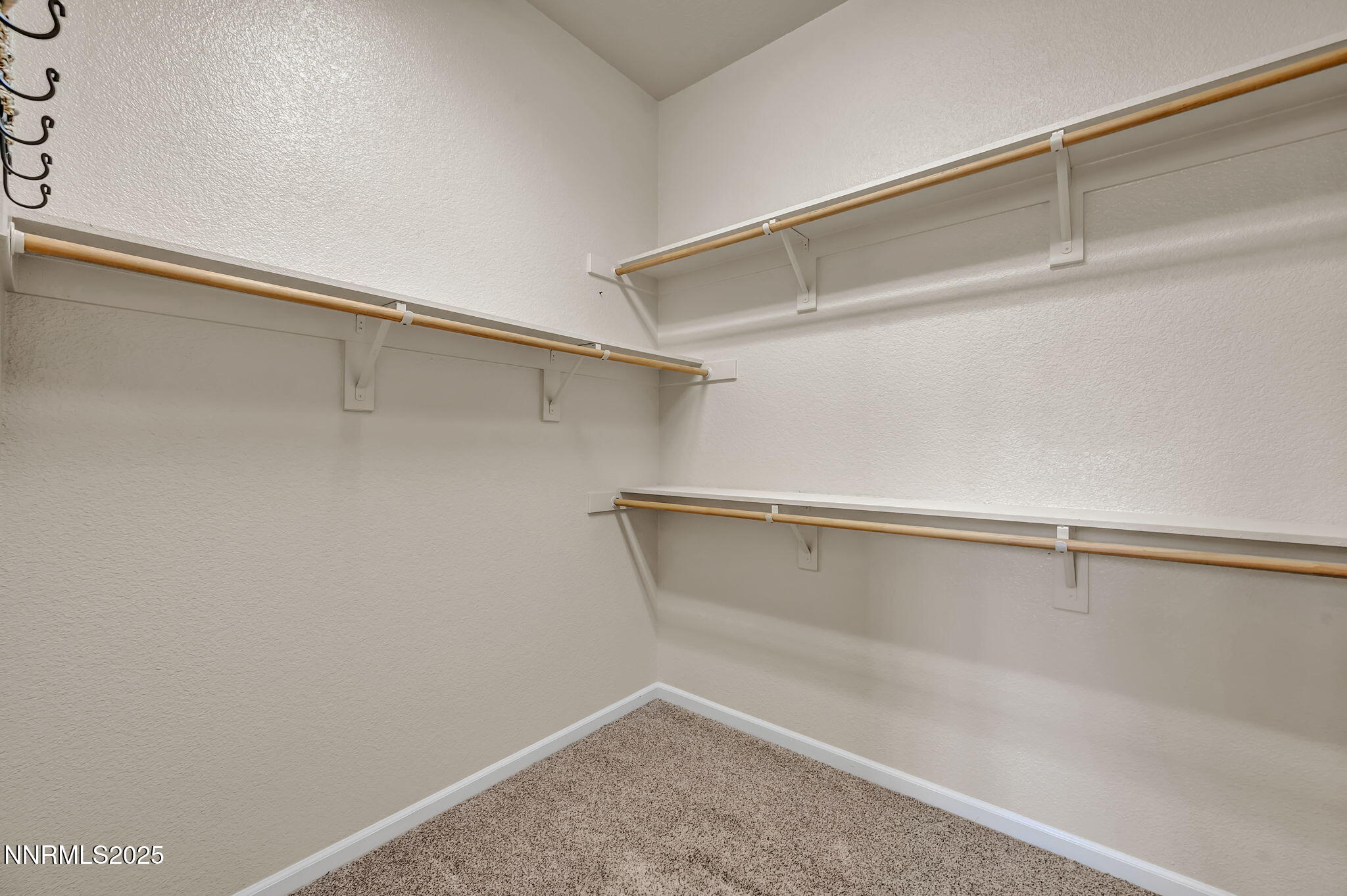 823 Gullane Court Dayton, NV 89403 - Photo 28 of 60 a view of a room with racks on the wall
