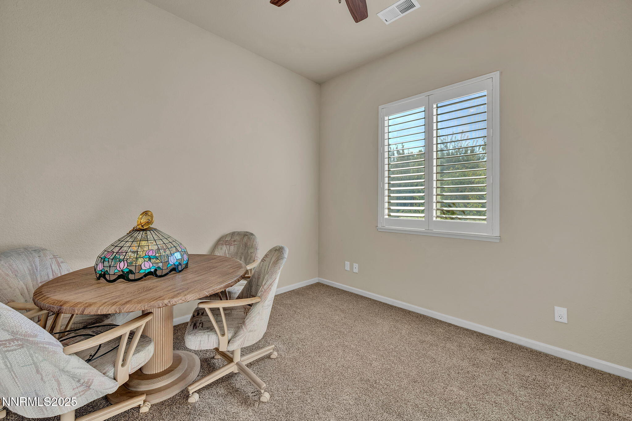 823 Gullane Court Dayton, NV 89403 - Photo 31 of 60 a dining room with furniture and window