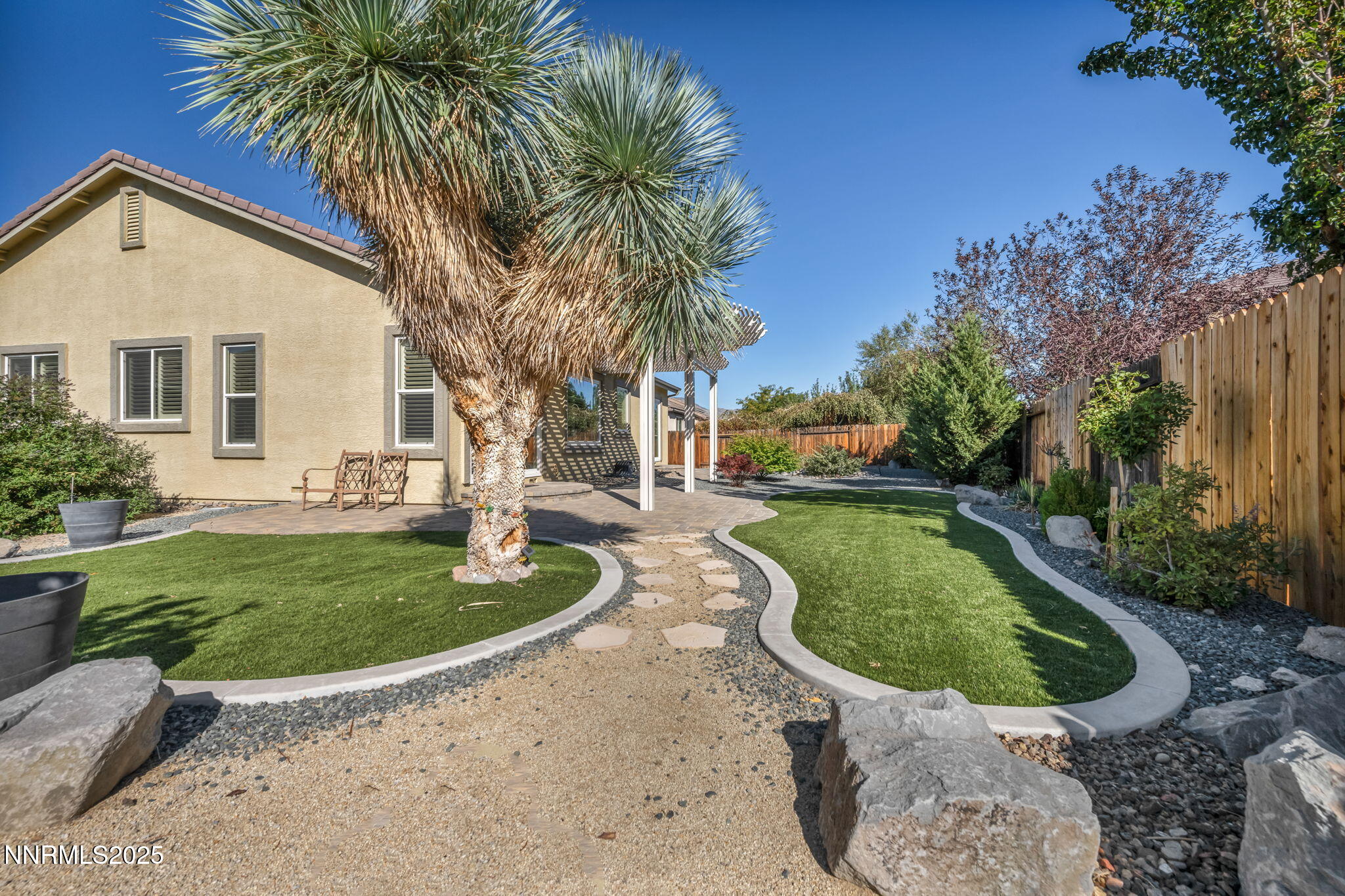 823 Gullane Court Dayton, NV 89403 - Photo 42 of 60 a view of a house with swimming pool and a yard