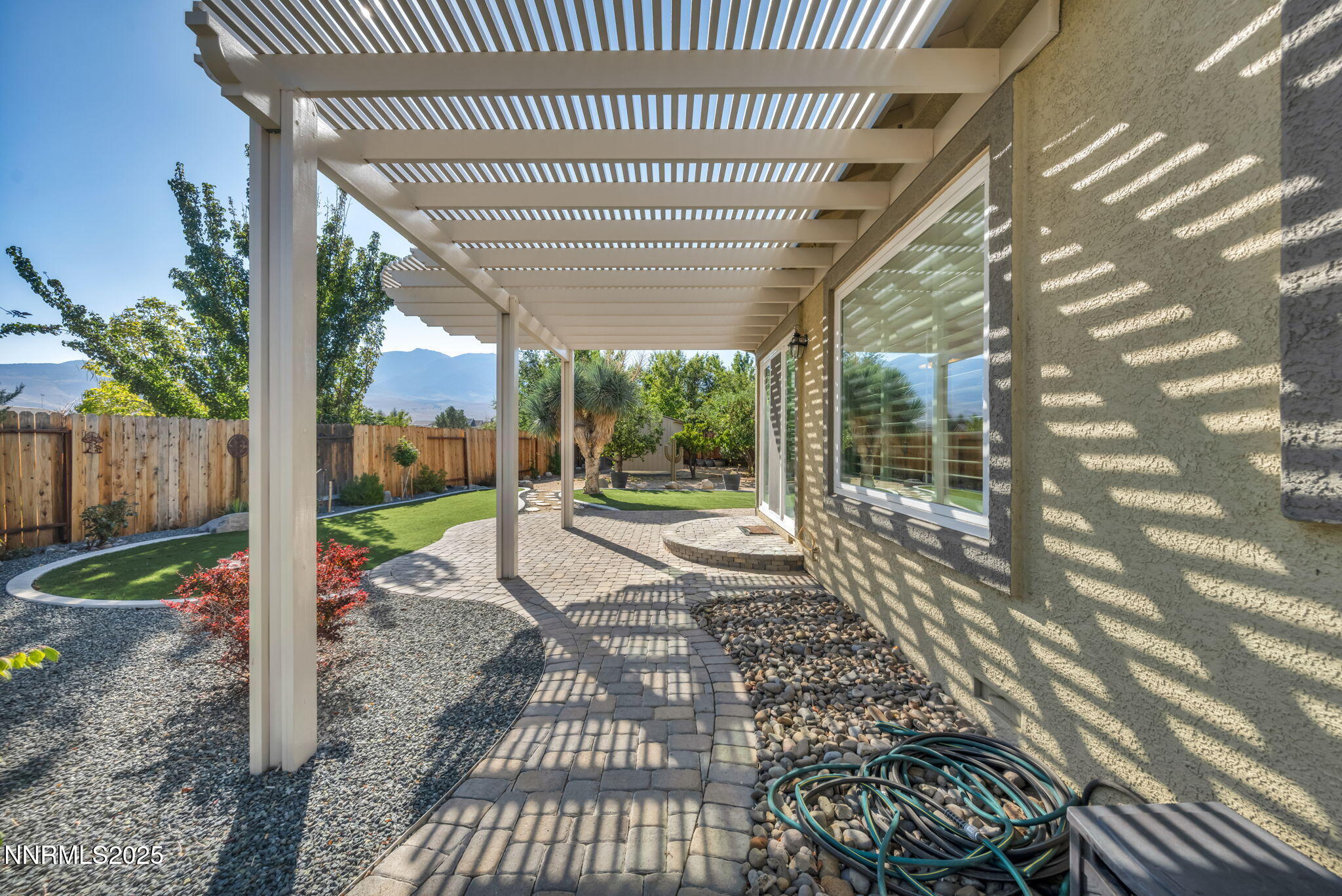 823 Gullane Court Dayton, NV 89403 - Photo 49 of 60 a view of a porch with a wooden fence