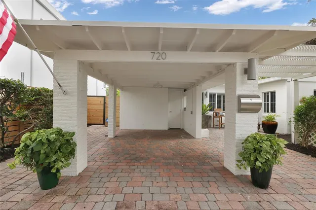 a view of a porch with seating space
