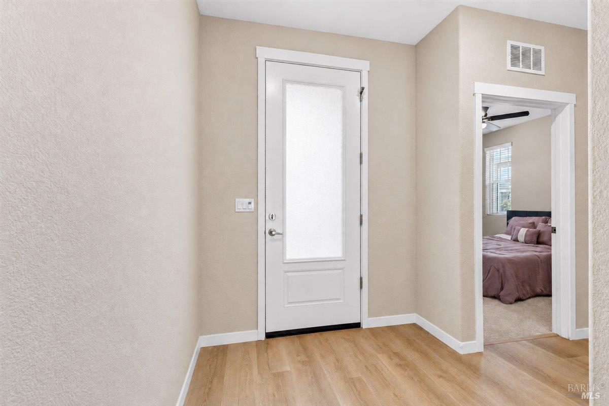 2275 Revival Lane Rio Vista, CA 94571 - Photo 17 of 31 a view of an empty room and wooden floor