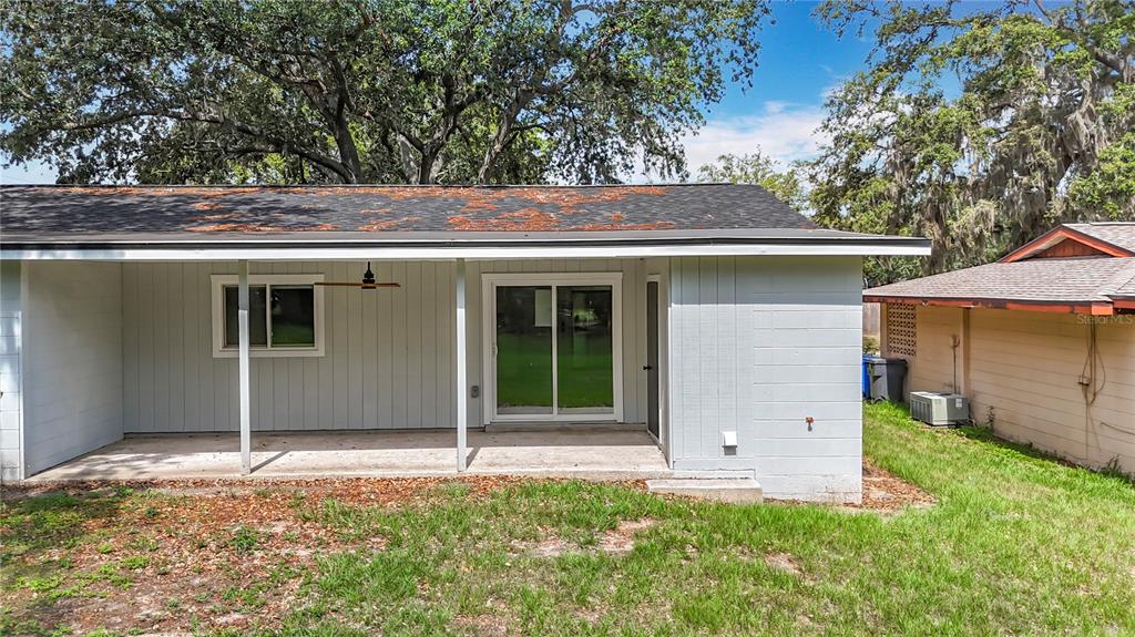 1305 Eagleview Drive Brandon, FL 33510 - Photo 23 of 27 a house with a tree in front of it