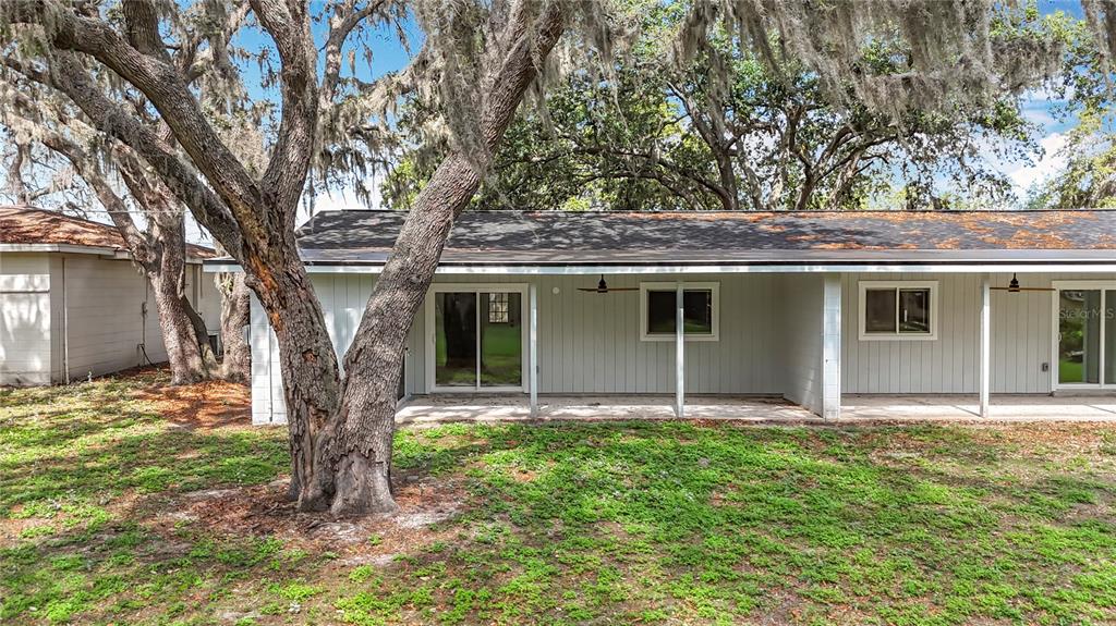 1305 Eagleview Drive Brandon, FL 33510 - Photo 24 of 27 a front view of a house with garden