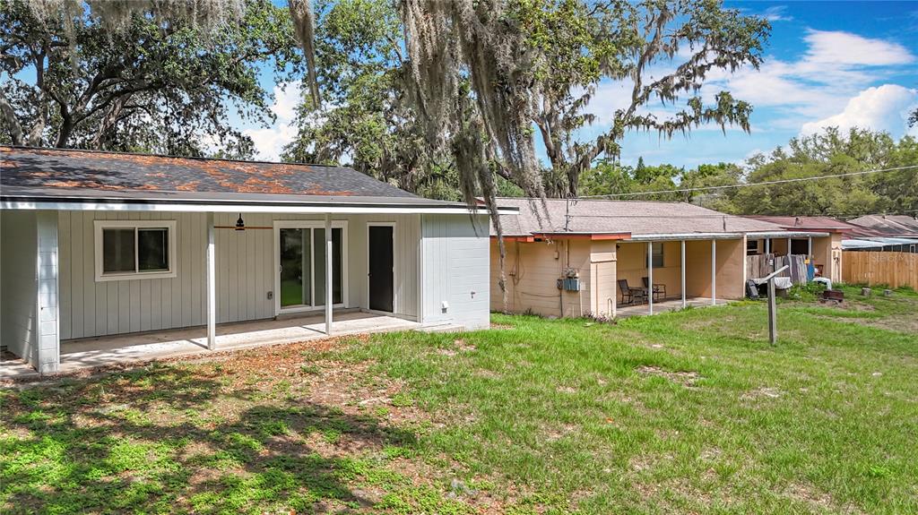 1305 Eagleview Drive Brandon, FL 33510 - Photo 27 of 27 a view of a house with a yard and porch