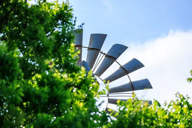 a view of backyard with sitting space