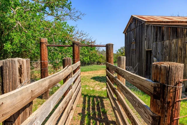 a view of a balcony with an ocean
