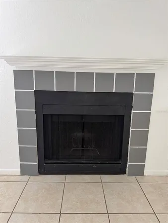 a living room with a fireplace