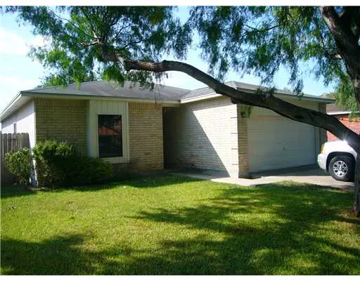 a house view with a garden space