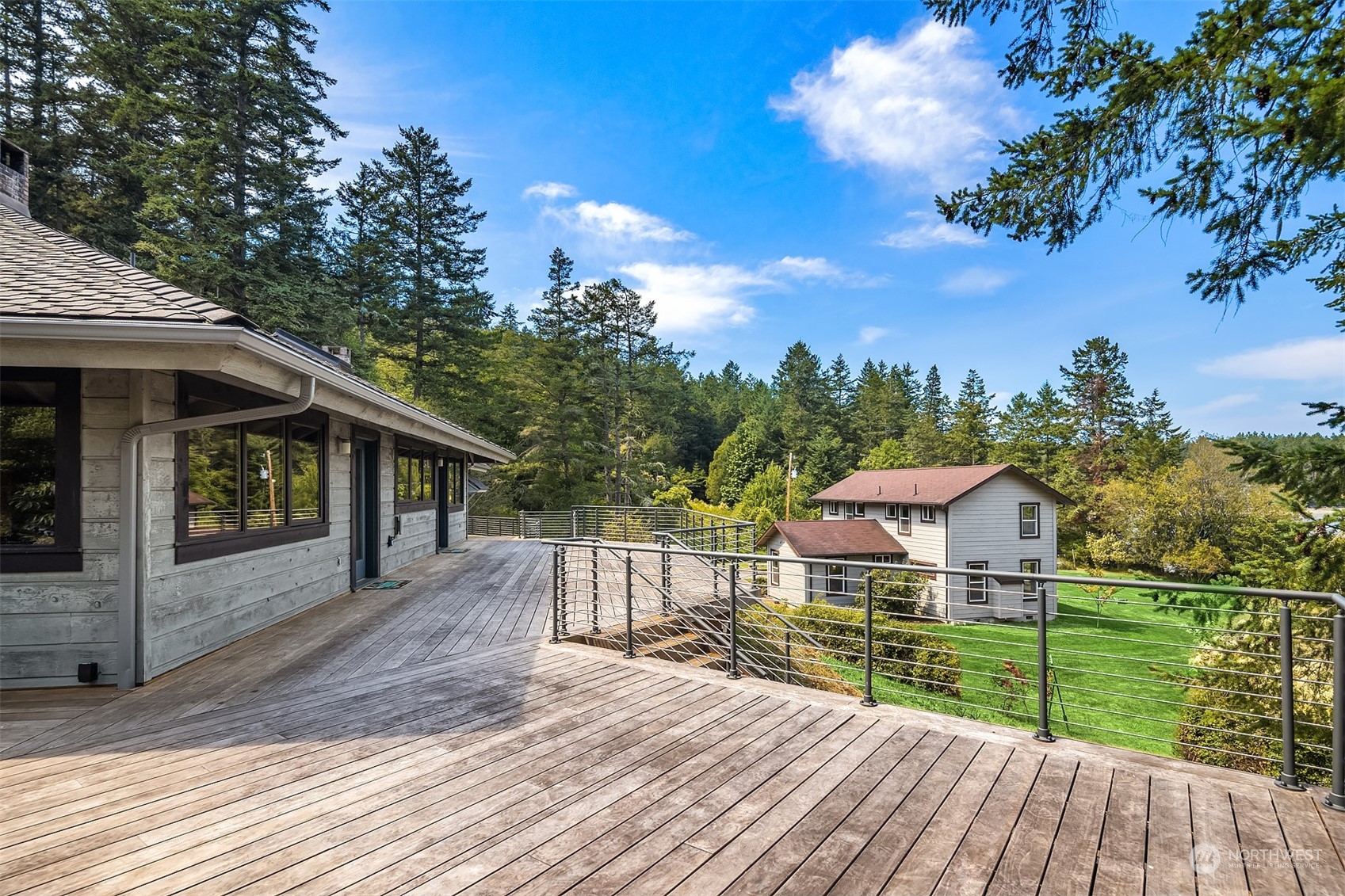 378 Smugglers Cove Road Shaw Island, WA 98286 - Photo 11 of 40 a view of a house with a yard