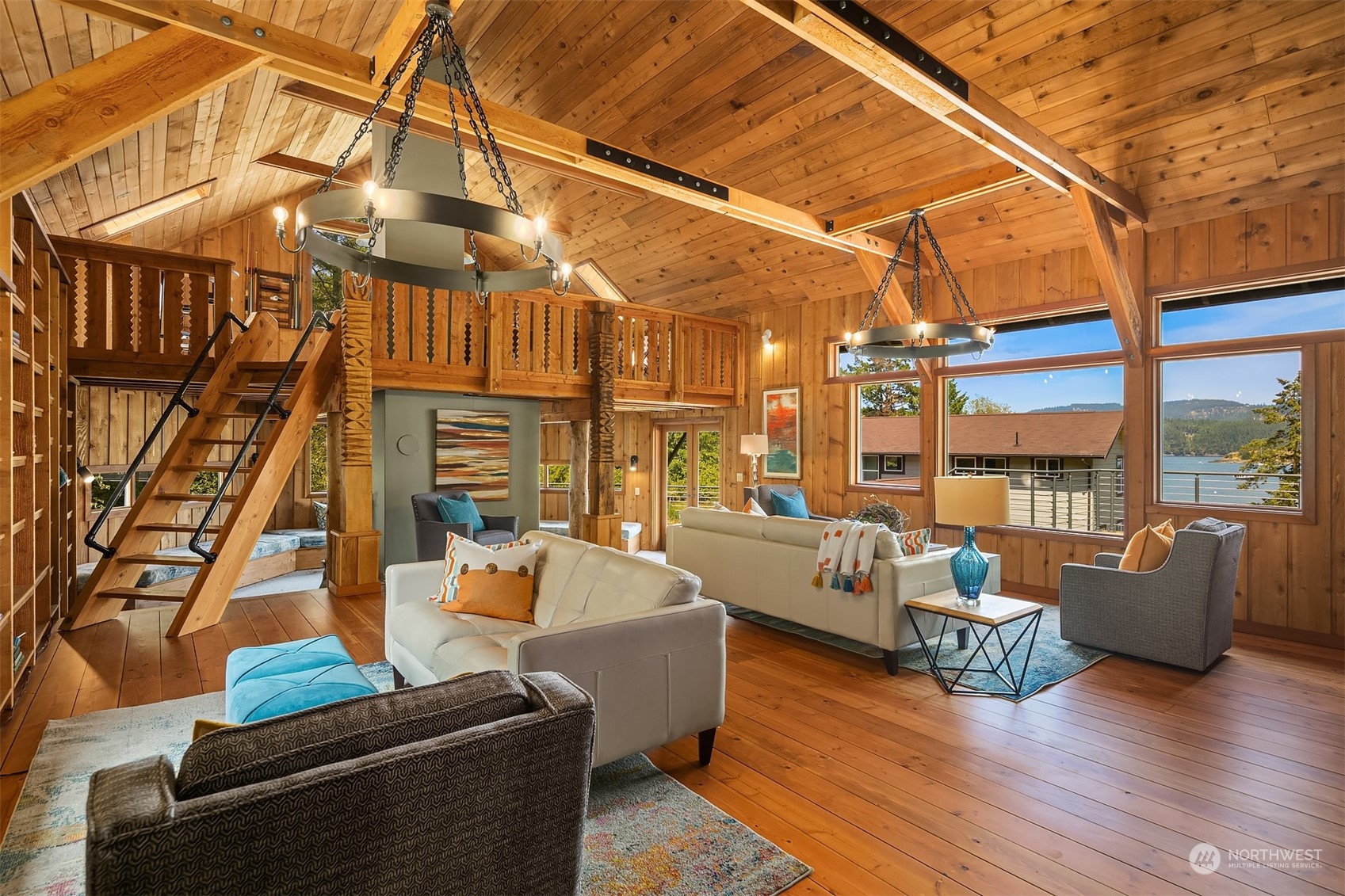 378 Smugglers Cove Road Shaw Island, WA 98286 - Photo 14 of 40 a outdoor living space with furniture and a flat screen tv