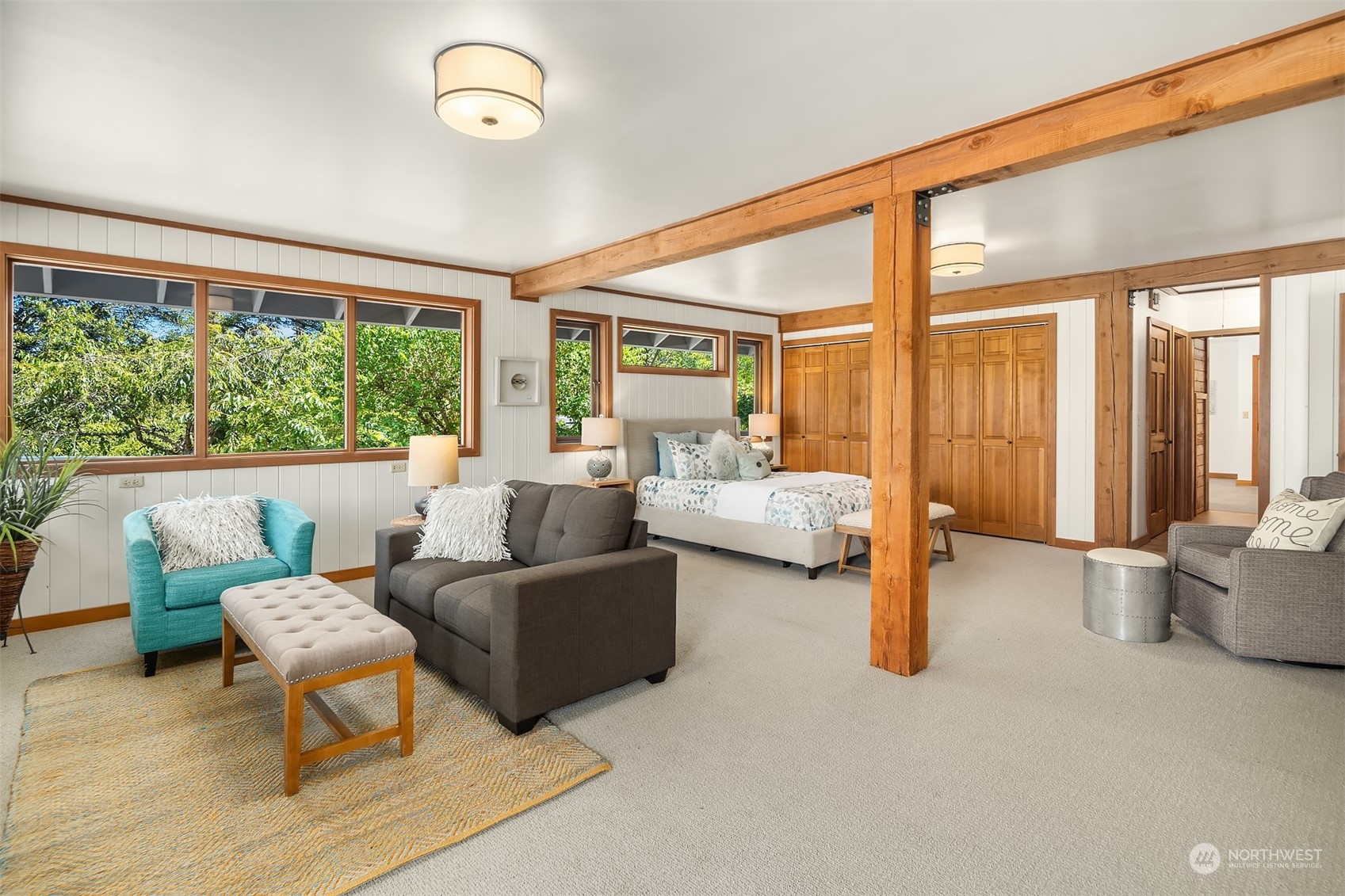 378 Smugglers Cove Road Shaw Island, WA 98286 - Photo 20 of 40 a living room with furniture and large windows