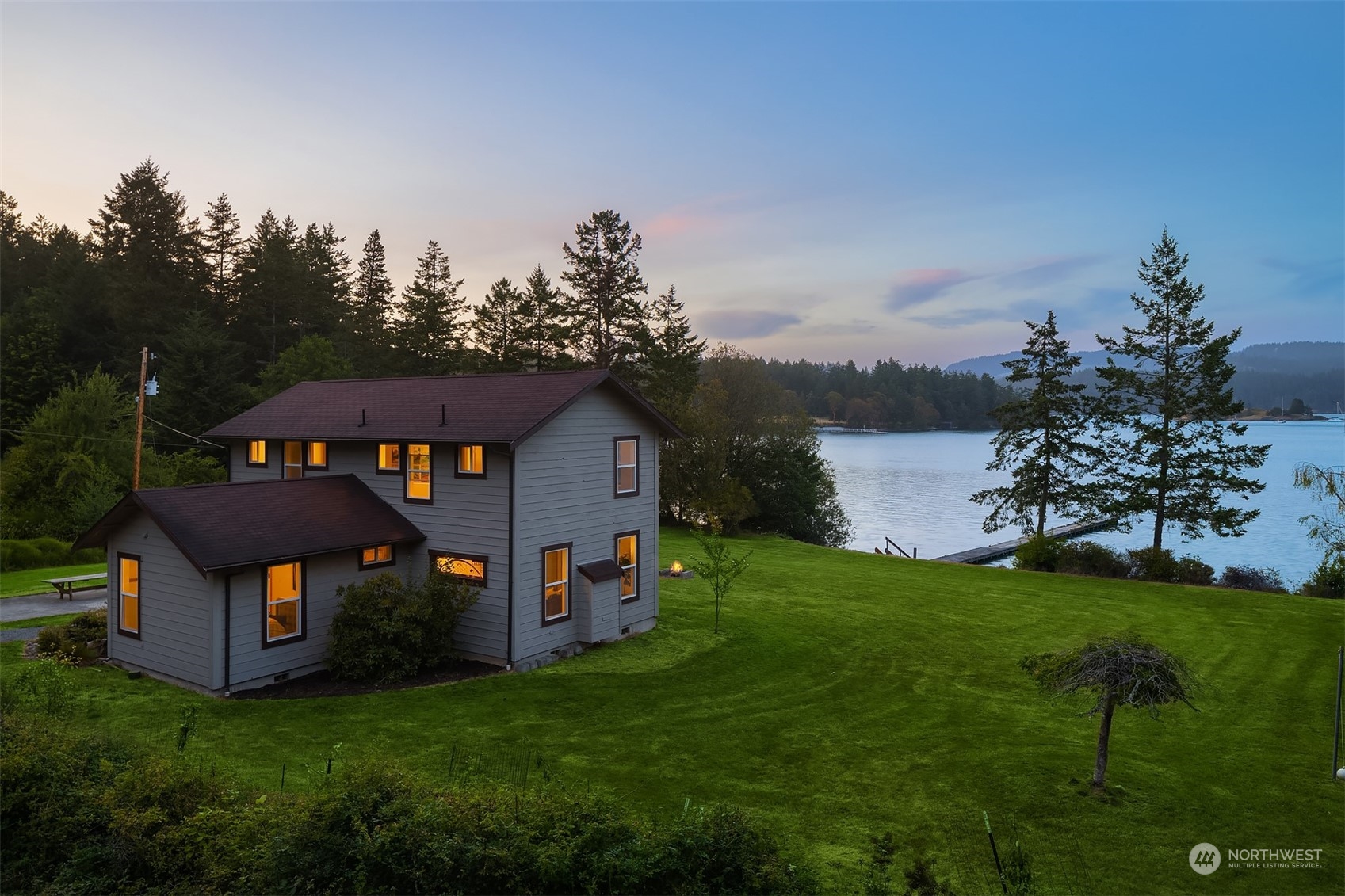378 Smugglers Cove Road Shaw Island, WA 98286 - Photo 23 of 40 a front view of a house with garden