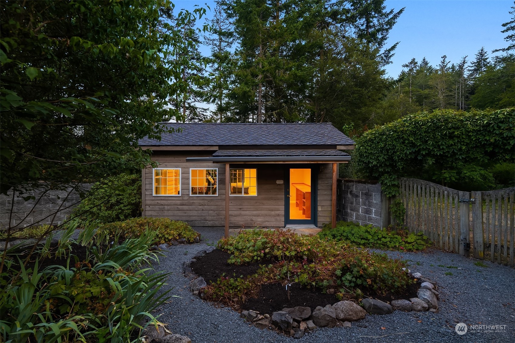 378 Smugglers Cove Road Shaw Island, WA 98286 - Photo 32 of 40 a front view of a house with garden