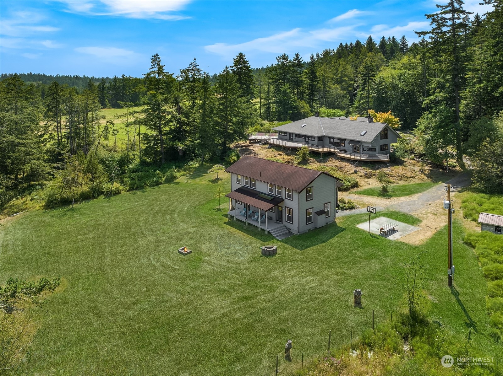 378 Smugglers Cove Road Shaw Island, WA 98286 - Photo 35 of 40 a view of a garden with houses