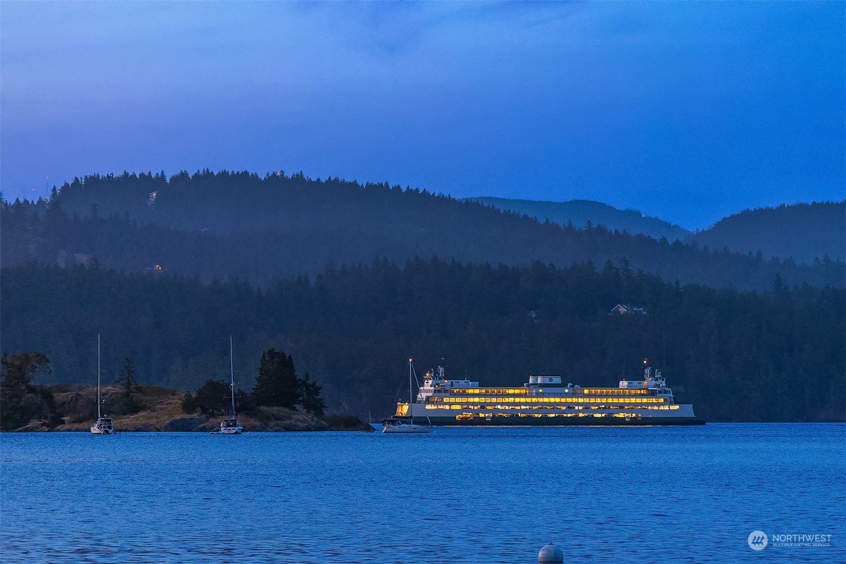 378 Smugglers Cove Road Shaw Island, WA 98286 - Photo 40 of 40 a view of a table and chairs in the room