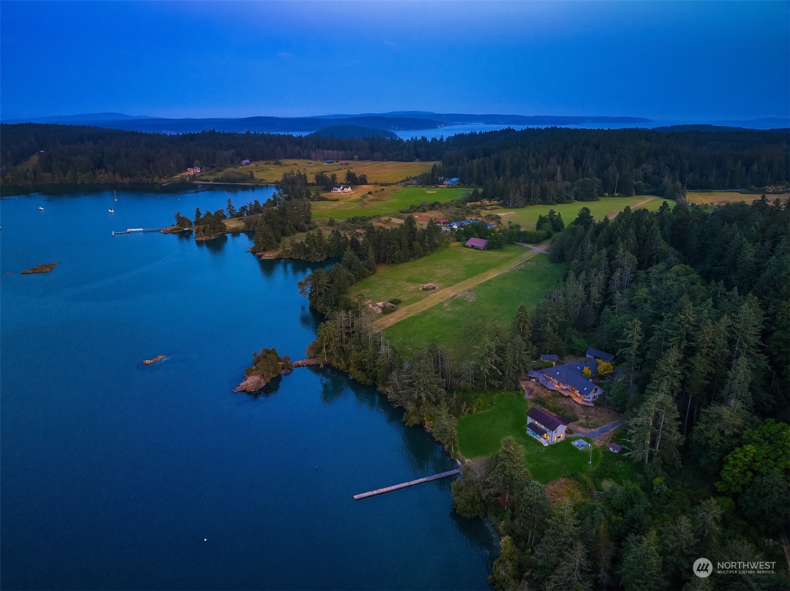 378 Smugglers Cove Road Shaw Island, WA 98286 - Photo 4 of 40 a view of a yard with an ocean view