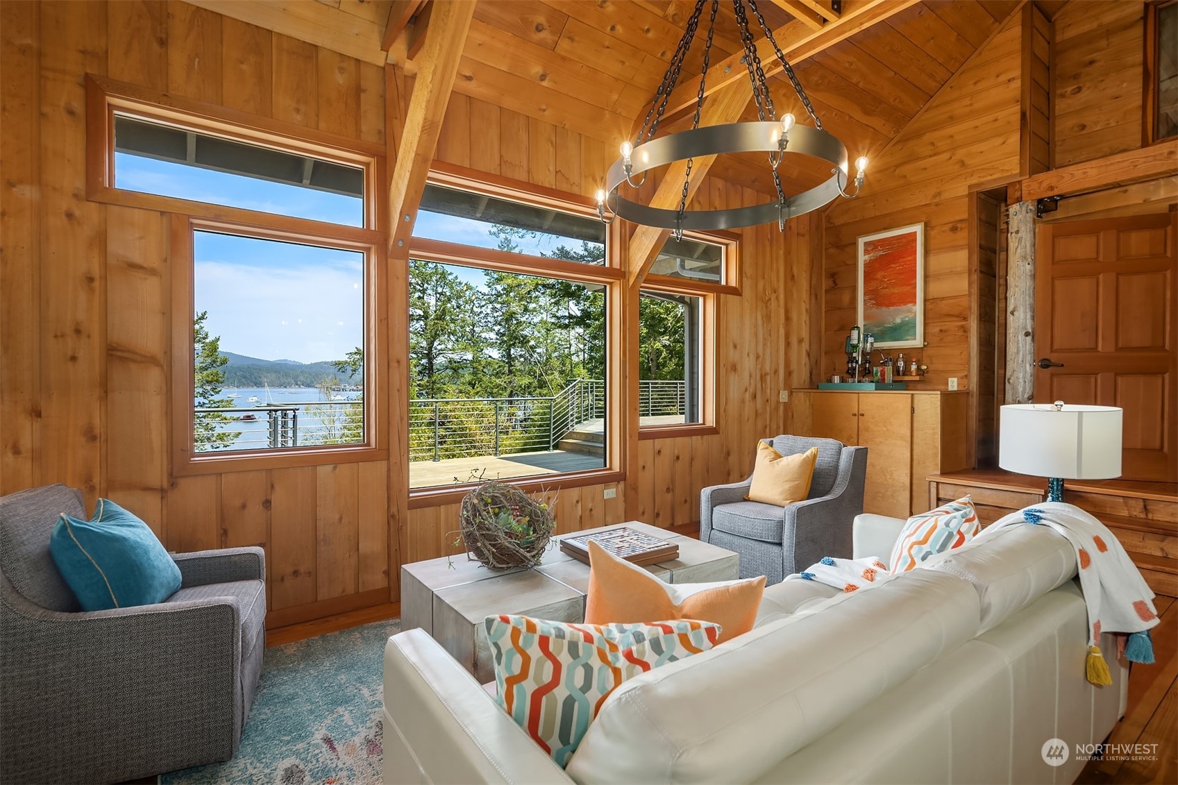 378 Smugglers Cove Road Shaw Island, WA 98286 - Photo 10 of 40 a living room with furniture and a large window